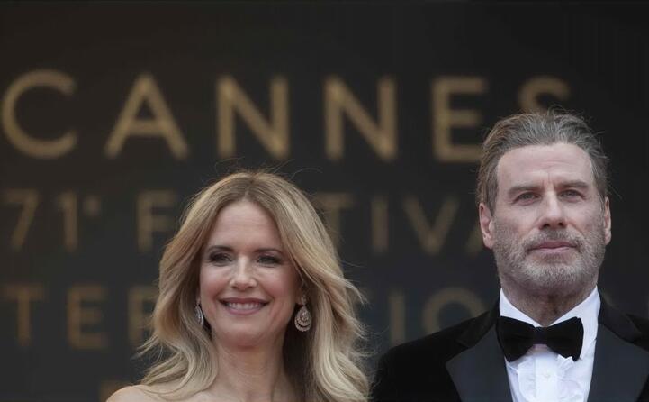 con la moglie kelly preston all ultima edizione del festival di cannes (ansa)