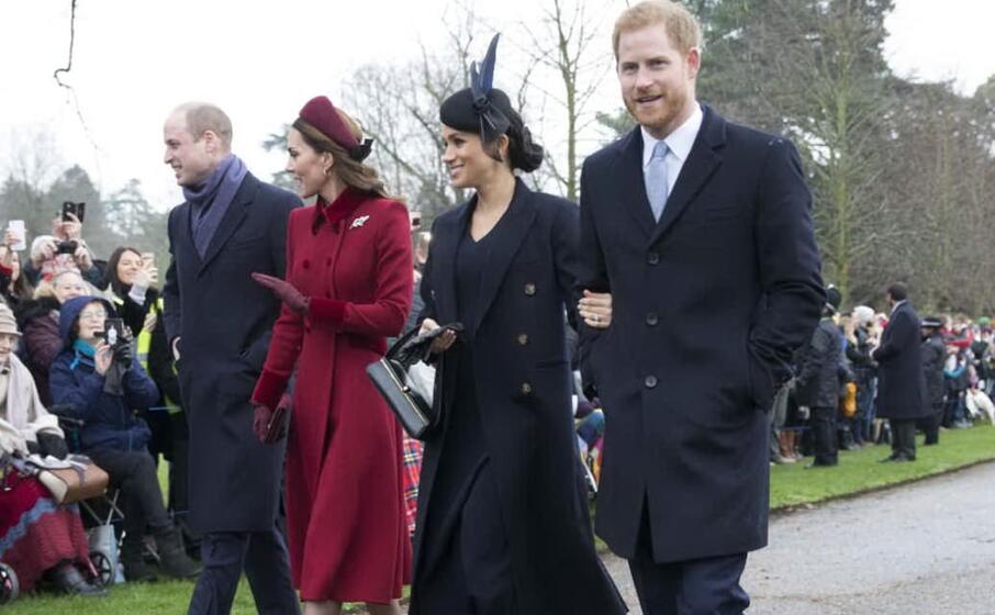 william e harry con le rispettive mogli (ansa)