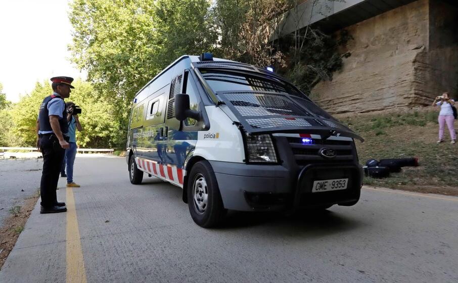 l arrivo degli imputati al processo (ansa epa)