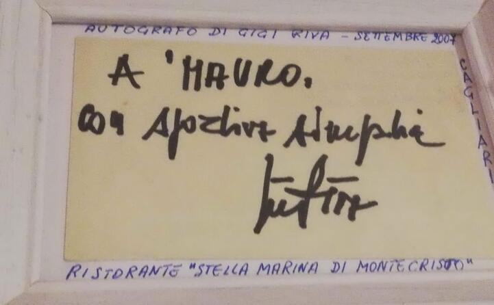 ho incontrato riva nel 2007 al ristorante questo il suo autografo che conservo gelosamente in cornice (mauro frau da domusnovas residente a roma)