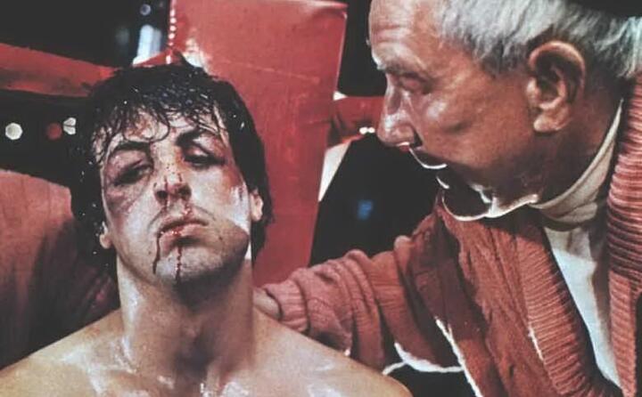 rocky all angolo con il suo coach