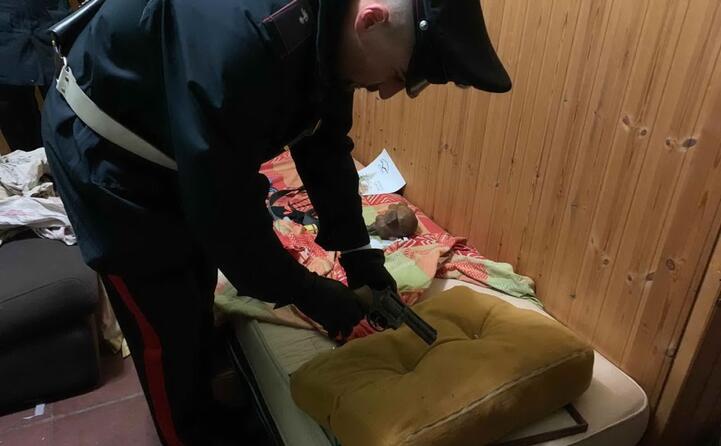 un arma