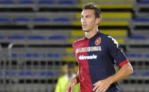 Davide Astori in rossoblù (Ansa)
